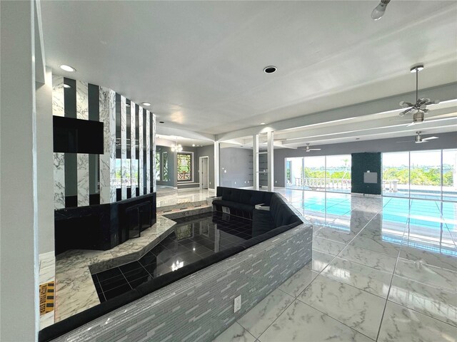 kitchen with light tile patterned flooring and ceiling fan