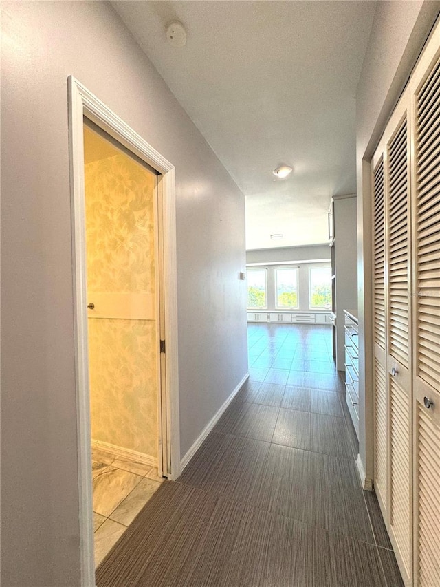 hallway featuring tile patterned floors