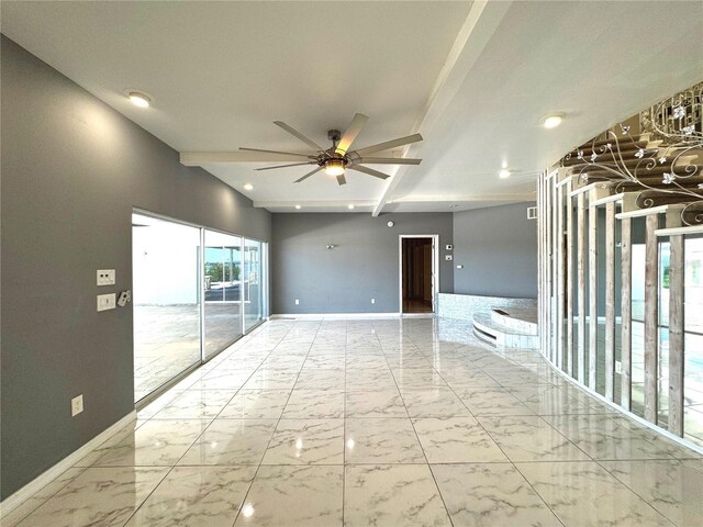 spare room with light tile patterned flooring and ceiling fan