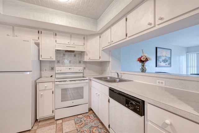 kitchen with white cabinetry, white appliances, light tile patterned flooring, tasteful backsplash, and sink