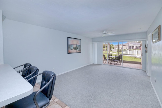 office with ceiling fan and light carpet