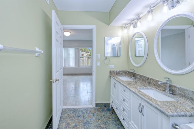 bathroom featuring dual vanity and tile patterned flooring