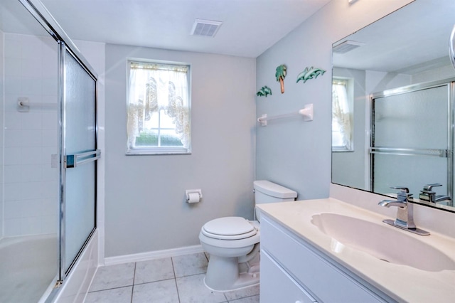 full bathroom featuring vanity, toilet, enclosed tub / shower combo, and tile patterned flooring