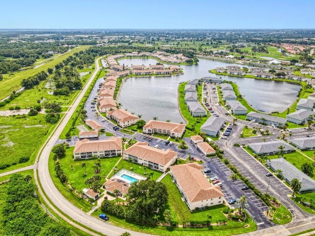 drone / aerial view with a water view