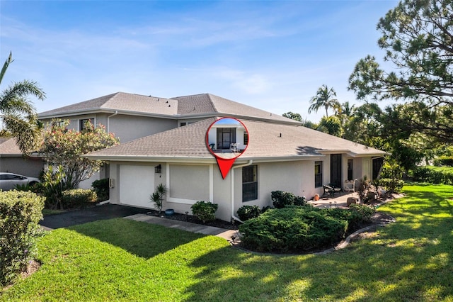 view of front of home with a front lawn