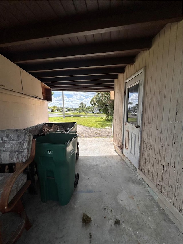 garage featuring wooden ceiling