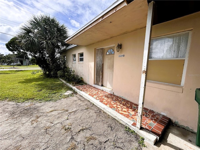 exterior space featuring a lawn