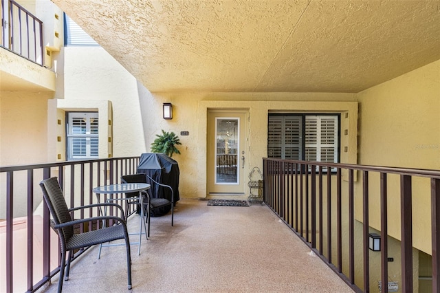 doorway to property featuring a balcony