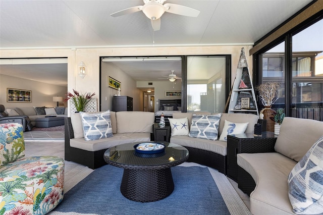 living room featuring ceiling fan