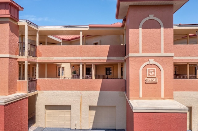 view of building exterior featuring a garage