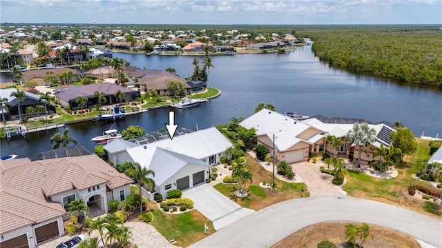 aerial view featuring a residential view and a water view