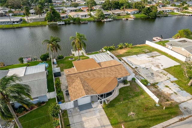 drone / aerial view with a water view