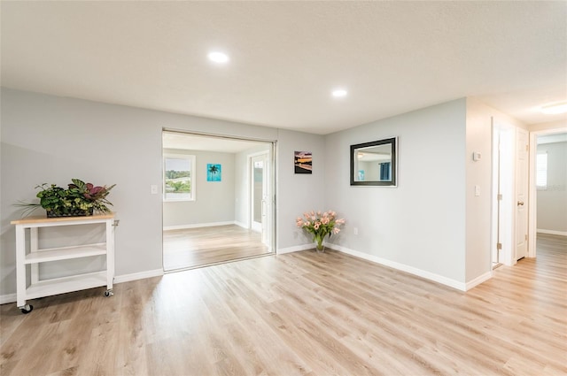 hall featuring light hardwood / wood-style floors