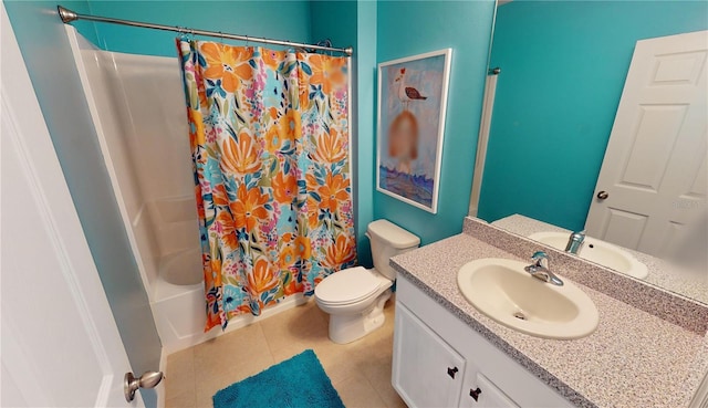 full bathroom with tile patterned floors, shower / tub combo with curtain, vanity, and toilet