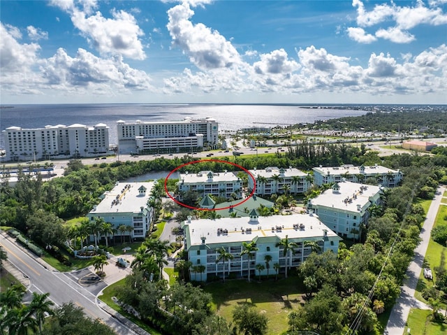 birds eye view of property featuring a water view