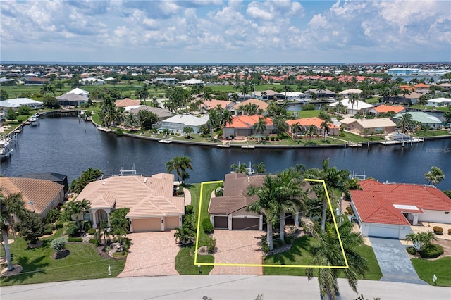 aerial view featuring a water view and a residential view