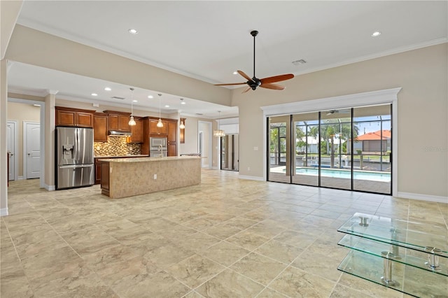 unfurnished living room featuring ceiling fan, crown molding, and light tile patterned flooring