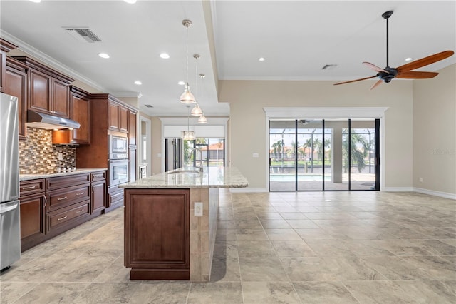 kitchen with backsplash, stainless steel appliances, sink, and light tile patterned floors