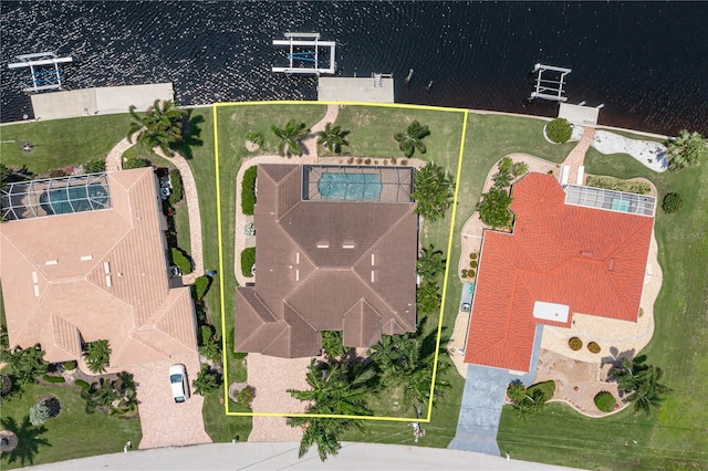 birds eye view of property featuring a water view