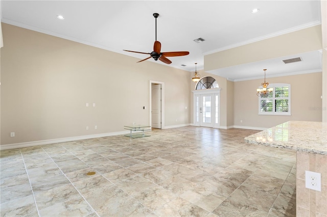 unfurnished living room featuring ceiling fan with notable chandelier, ornamental molding, and light tile patterned floors