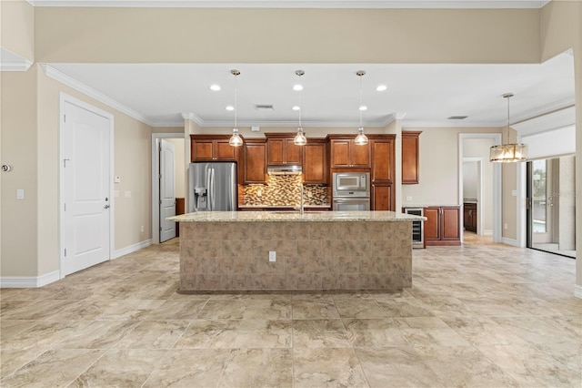 kitchen with stainless steel appliances, pendant lighting, a kitchen island with sink, light stone countertops, and tasteful backsplash