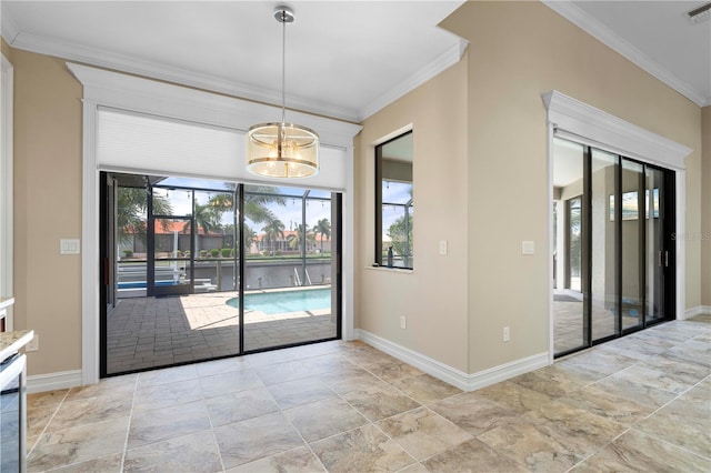 unfurnished dining area featuring plenty of natural light, baseboards, and crown molding