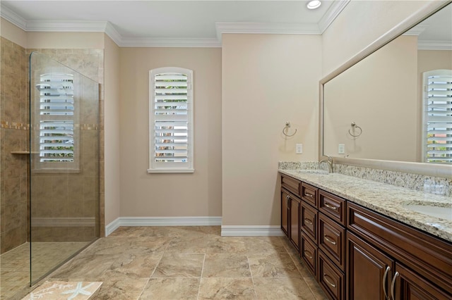 bathroom featuring double vanity, walk in shower, ornamental molding, and tile patterned flooring