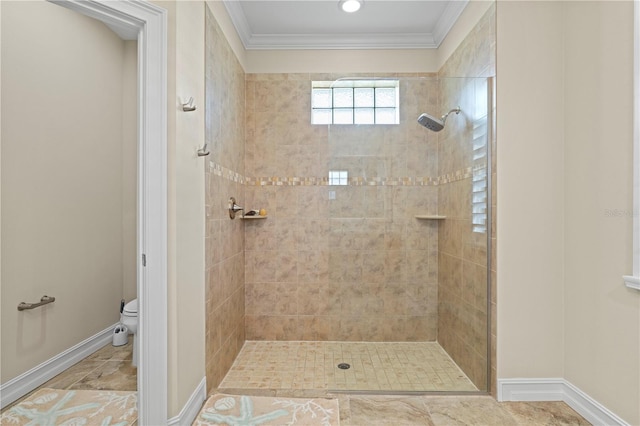 bathroom featuring toilet, ornamental molding, and tile patterned floors