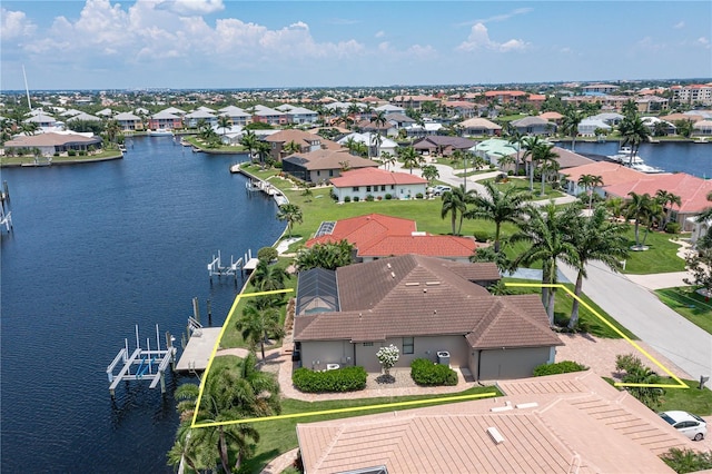 aerial view featuring a residential view and a water view