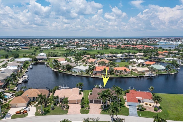 aerial view featuring a water view and a residential view