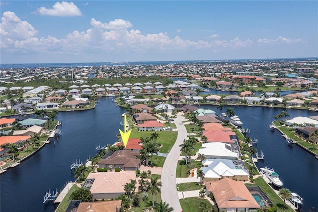 aerial view featuring a water view and a residential view