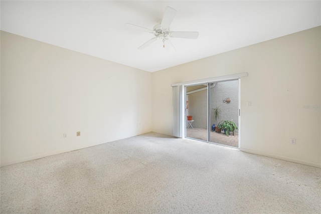 spare room with ceiling fan