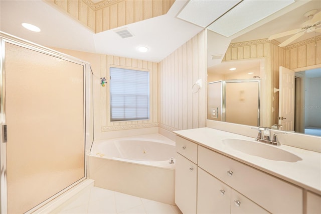 bathroom with plus walk in shower, tile patterned floors, and vanity