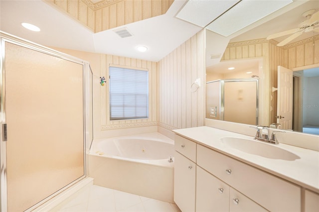 full bath with a jetted tub, vanity, and wallpapered walls