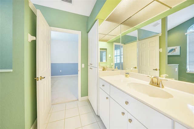 bathroom with vanity and tile patterned floors