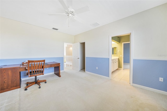 home office with light colored carpet and ceiling fan