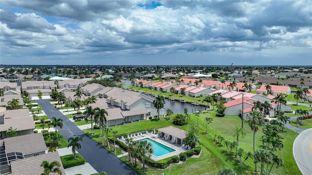 birds eye view of property with a residential view