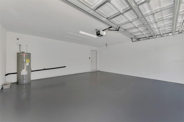 4582 Enid Ln, North Port, FL 34288 - garage featuring water heater and a garage door opener