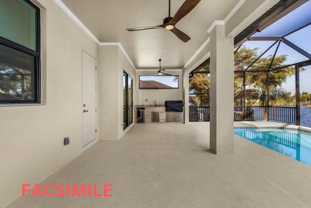 view of pool with glass enclosure, ceiling fan, and a patio area