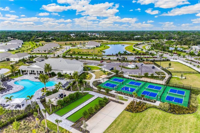 aerial view with a water view and a residential view