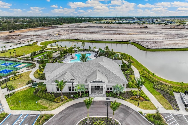 drone / aerial view with a water view