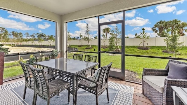 sunroom featuring plenty of natural light