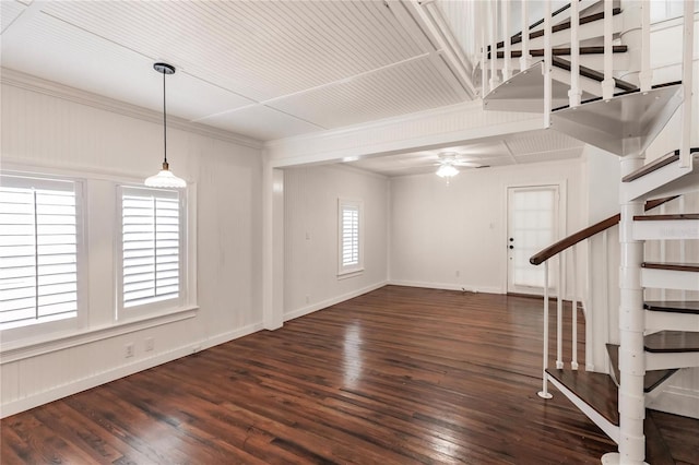 entrance foyer featuring ceiling fan and dark wood-type flooring