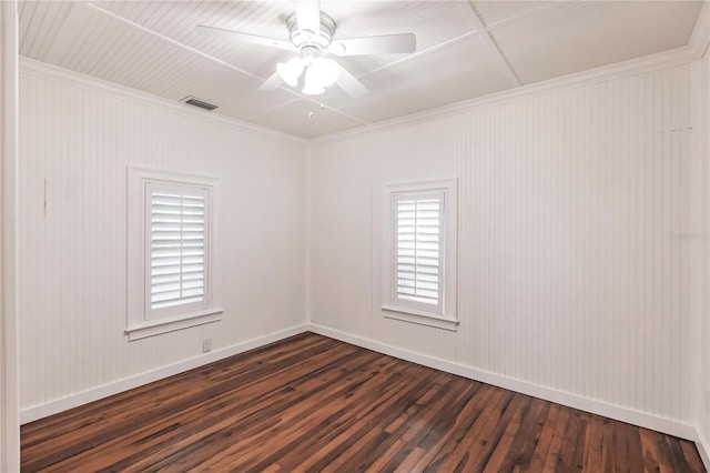 empty room with ceiling fan, ornamental molding, and hardwood / wood-style flooring