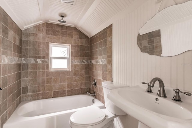 bathroom with sink, lofted ceiling, and toilet