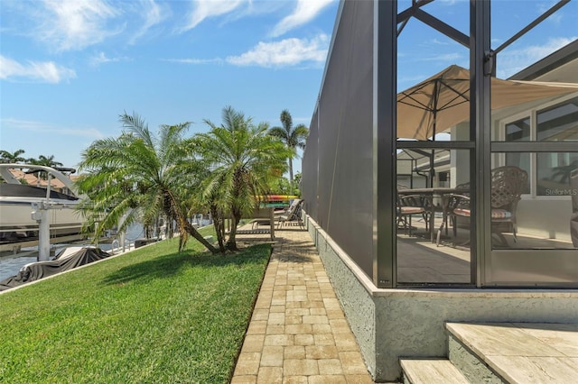 view of yard featuring a lanai