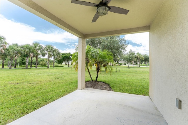 view of patio / terrace featuring ceiling fan