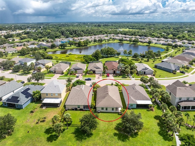 bird's eye view with a water view