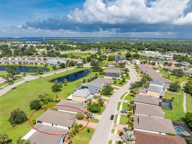 bird's eye view with a water view