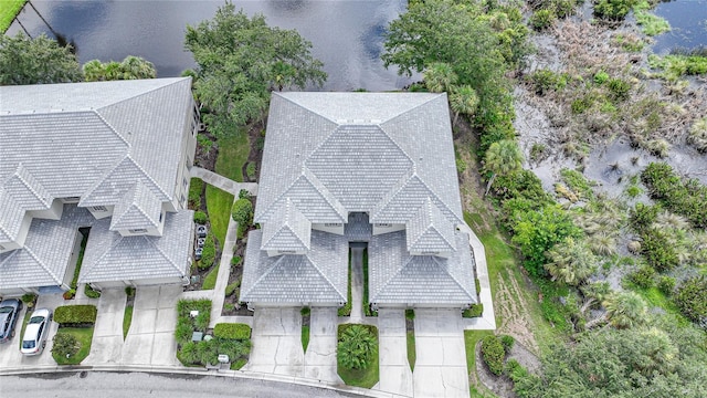 drone / aerial view featuring a water view